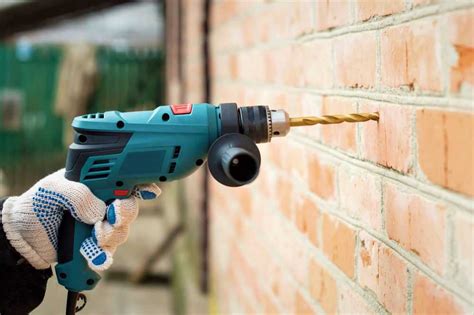 drilling hole through brick walls